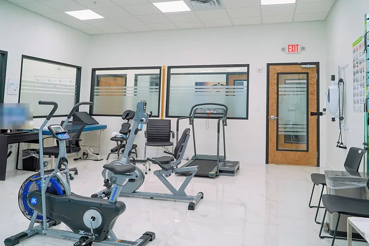 The physical therapy room and its exercise machines