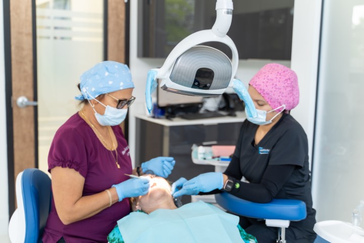 Patient receiving professional dental care at Metropolitan Smile Design in Tamarac, Florida.