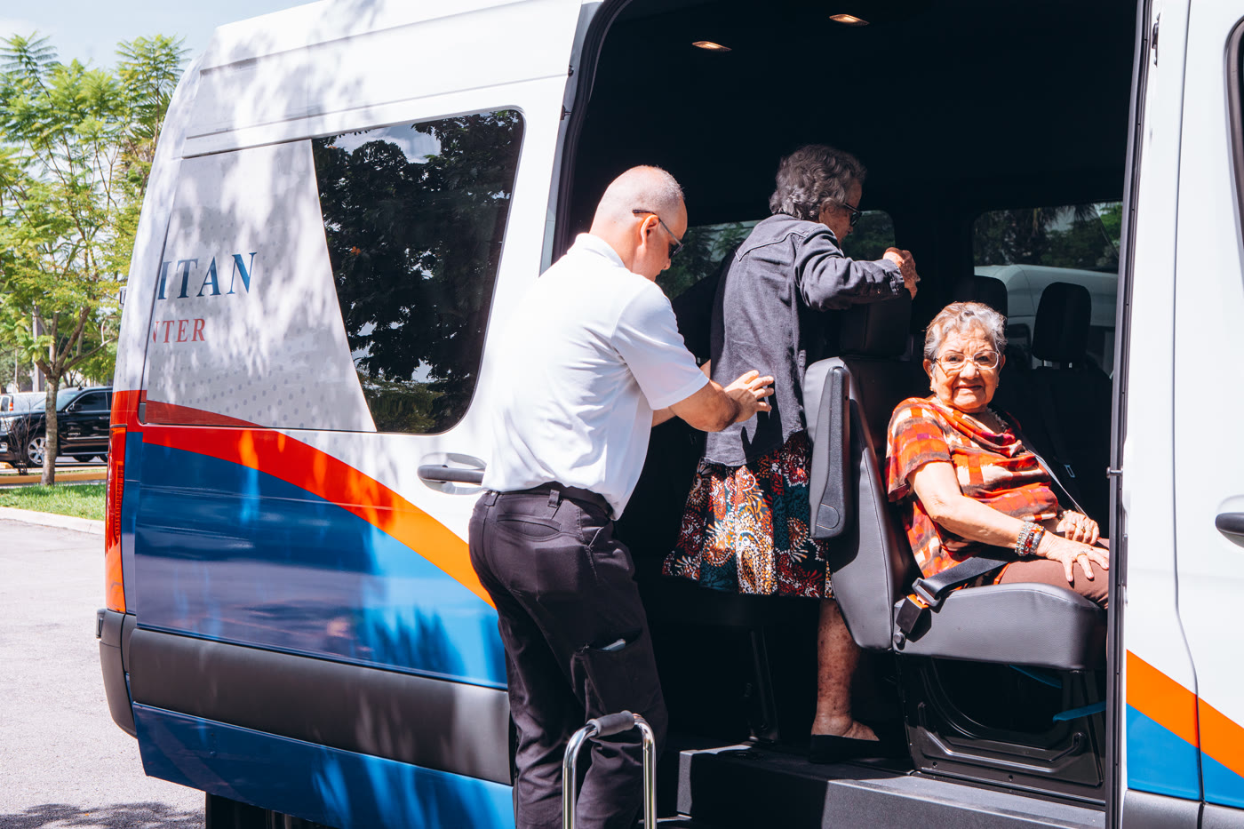 Patients boarding the free Metropolitan Medical Centers transportation van